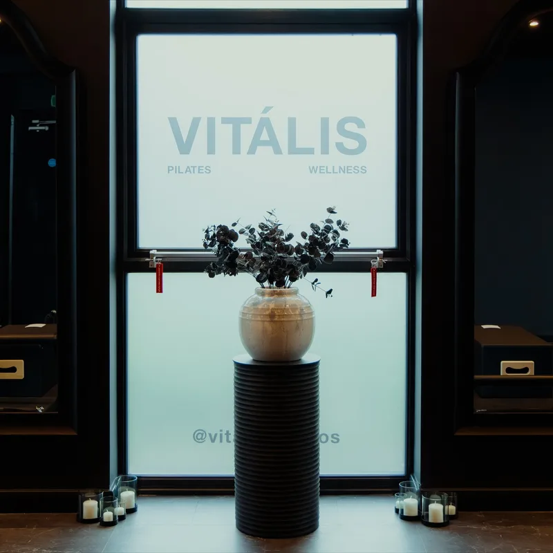 Vitális Studios window signage on Broadway, Newport